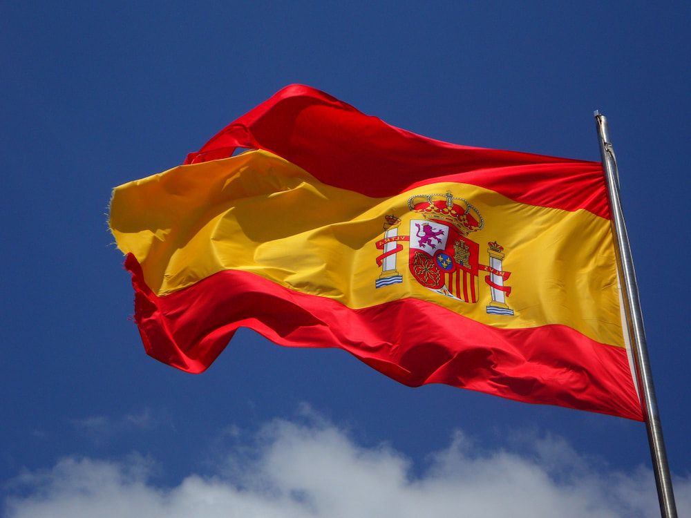 spanish flag waving in the wind