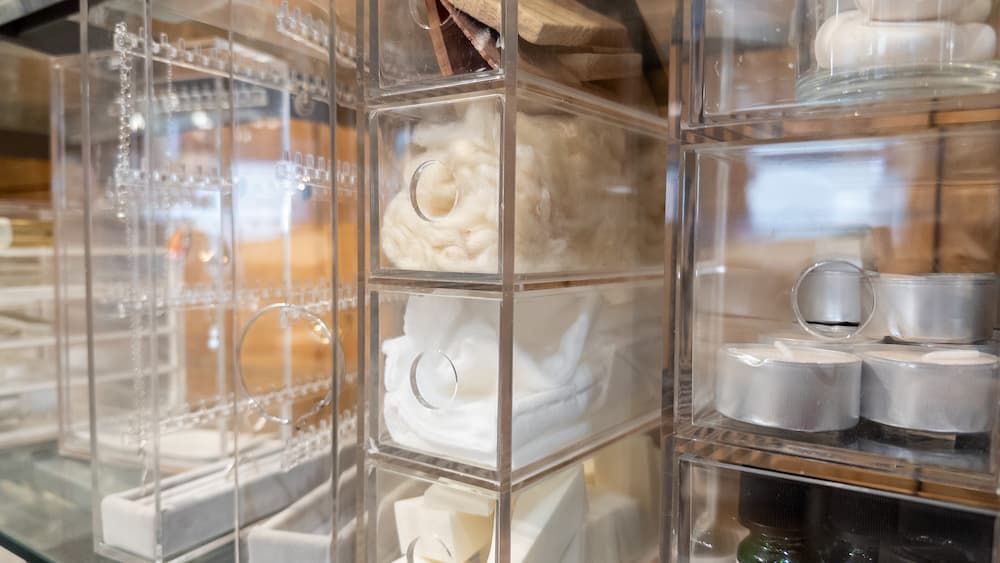 Plastic storage containers and sliding drawers