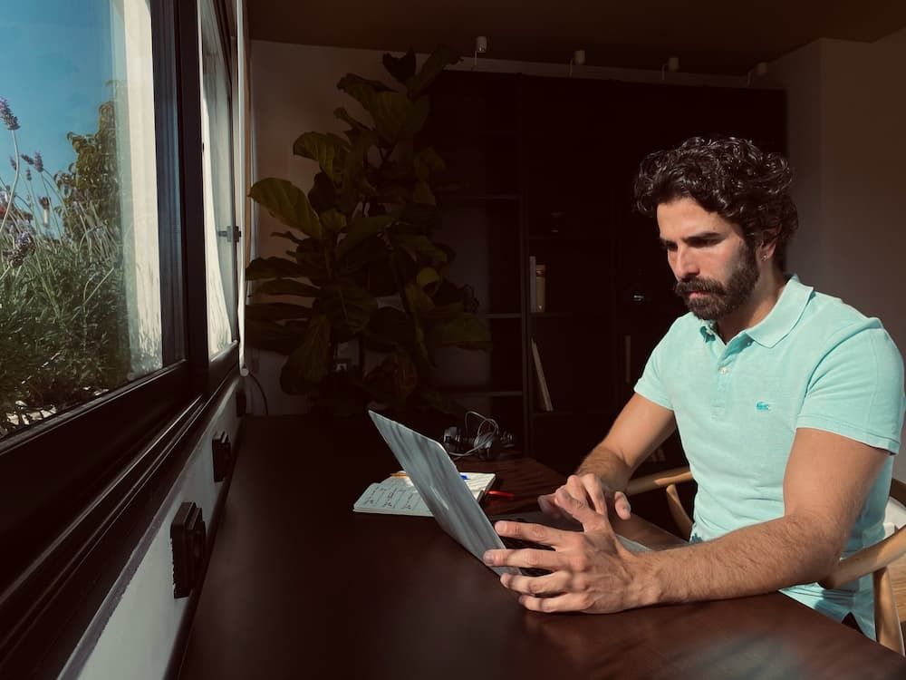 Man on an apple laptop