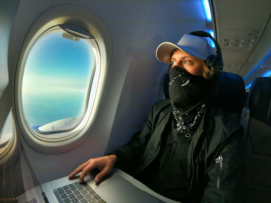 man flying with mask and computer