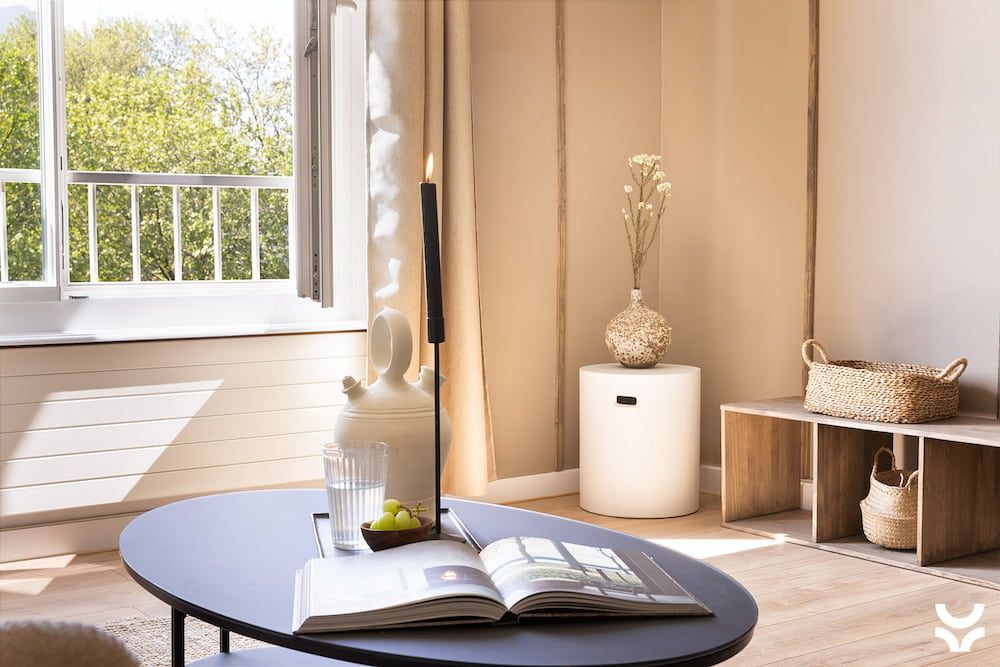 Chic interior showing the details of a coffee table and neutral decor