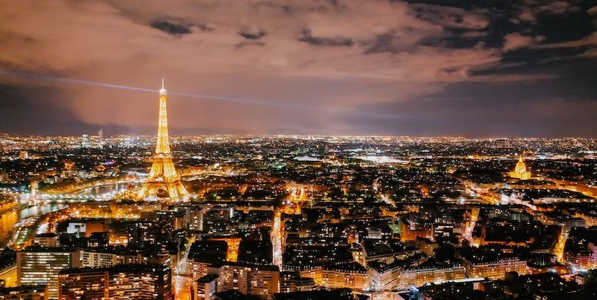 Eiffel tower lit up at night