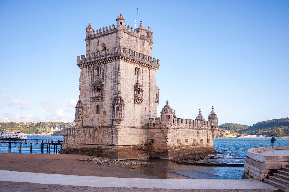 tower of belem along the ocean