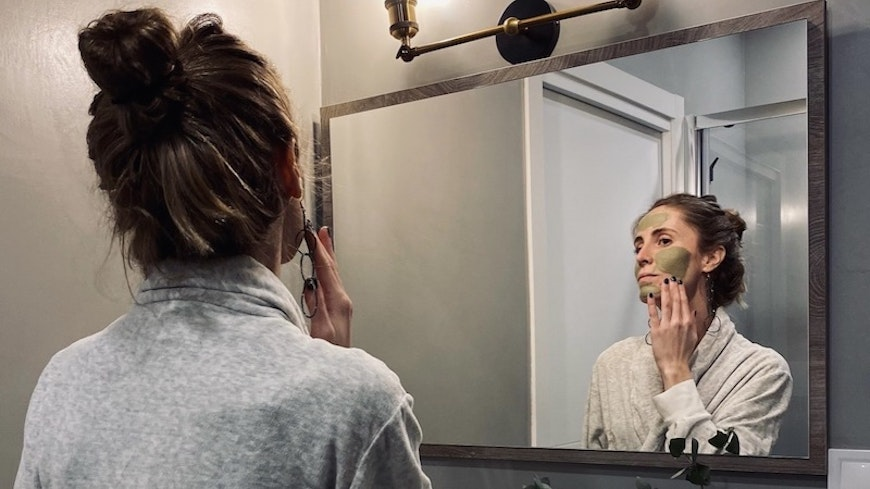 woman doing face mask