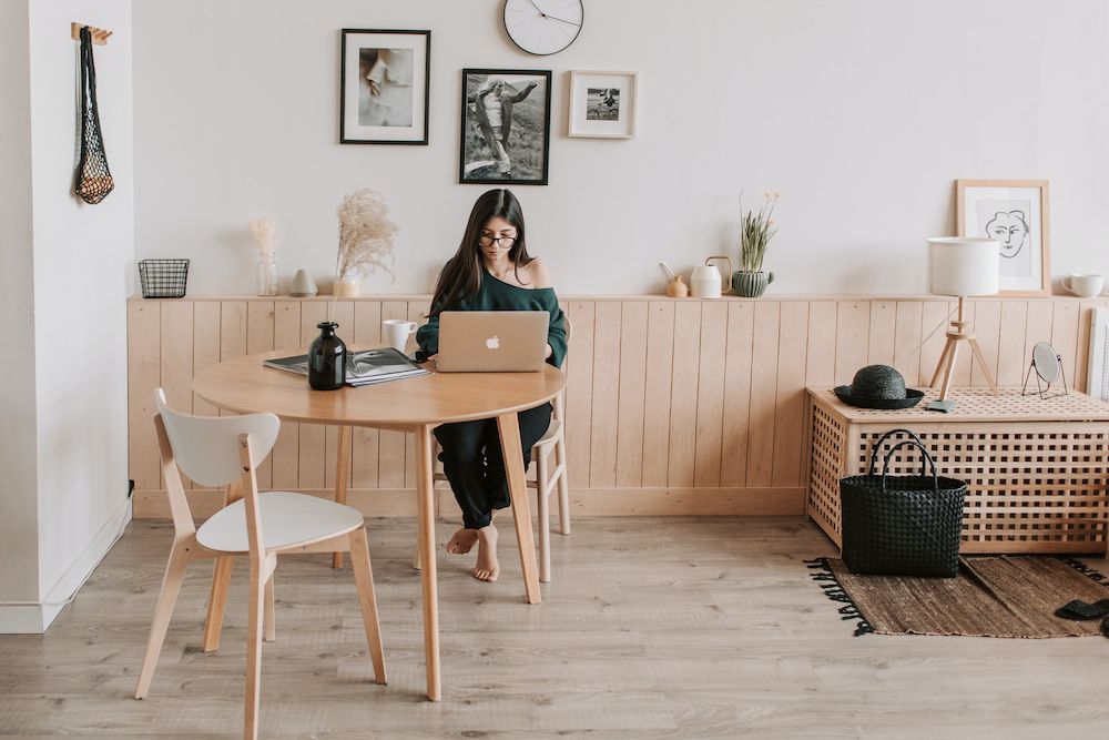 woman on computer in apartment