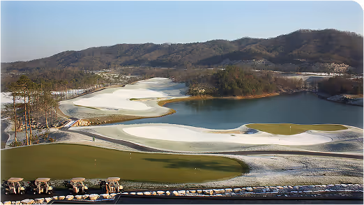 Diagram of SubAir hydronic system showing air and water flow beneath a golf green, ideal for educating on turf aeration and subsurface drainage.