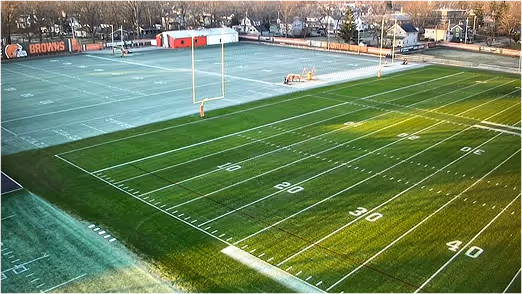Aerial view of Cleveland Browns training facility fields with frost and lined football turf in Berea, Ohio