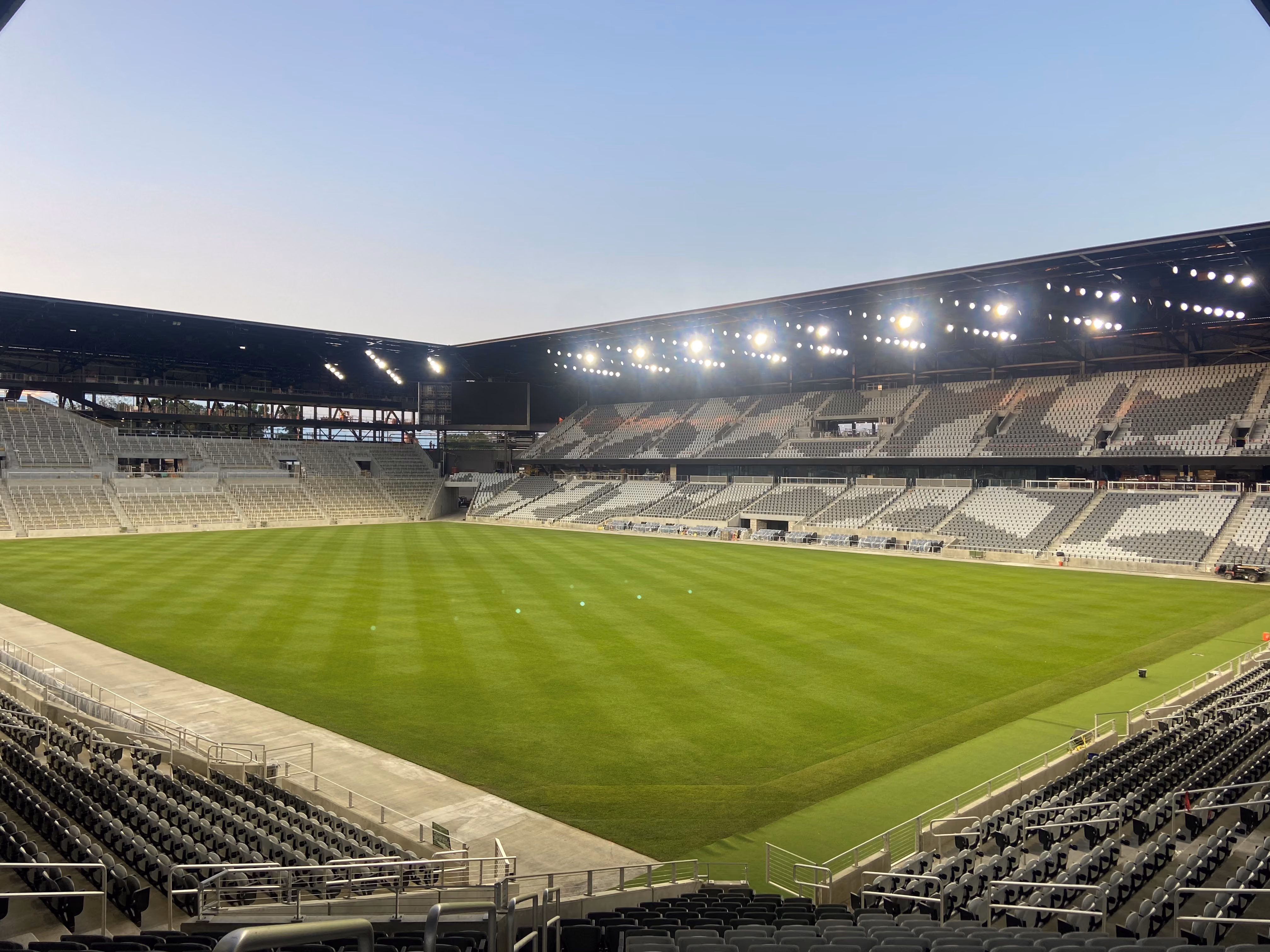 Large image of the Columbus Crew Soccer Stadium taken from the corner of the seating area at dusk.