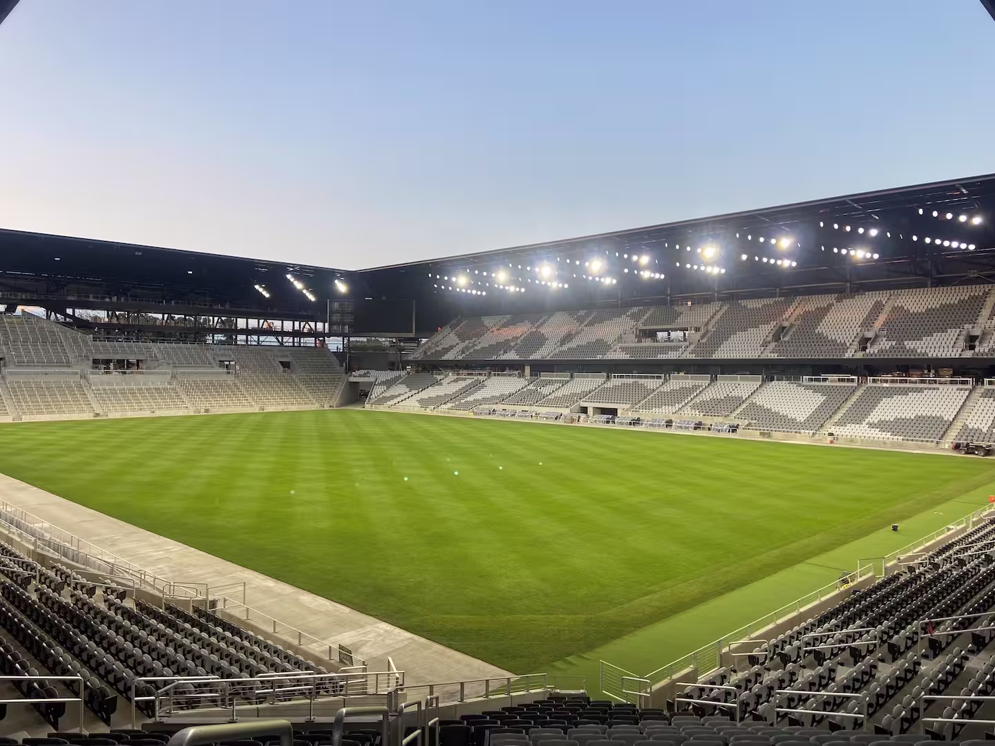 Large image of the Columbus Crew Soccer Stadium taken from the corner of the seating area at dusk