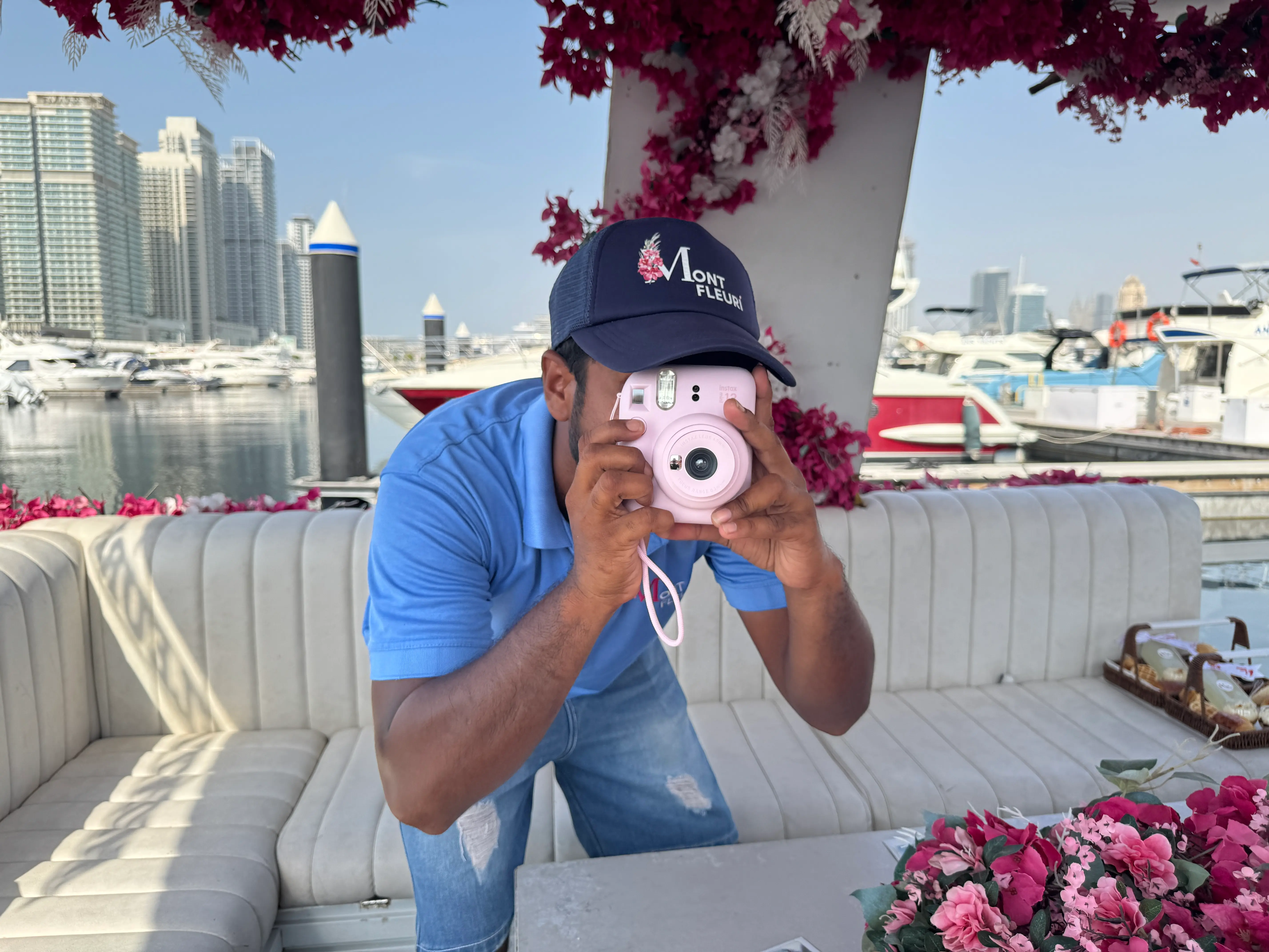 The captain taking photos of guests inside of Mont Fleuri to create unforgettable memories