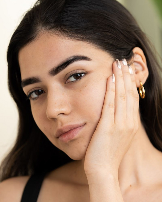 Natural-looking beauty spot placed on the upper cheek