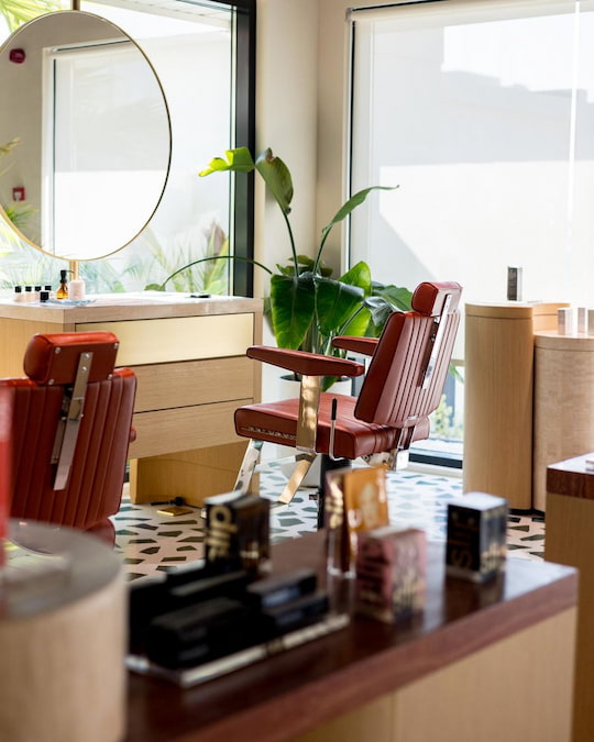 Brau studio interior with styling chairs and mirror