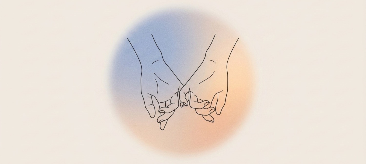 Two hands gently clasping in gratitude and prayer