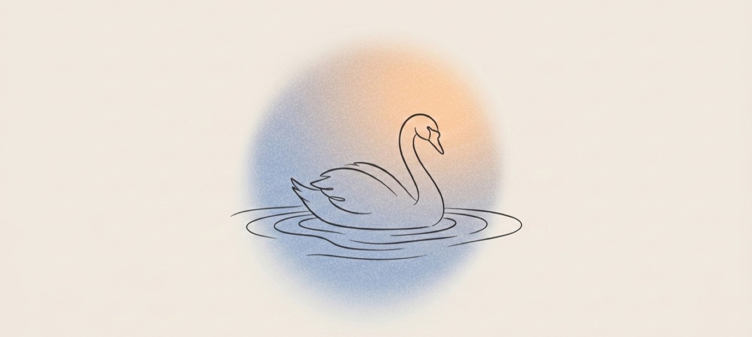 Swan gliding across calm water, a picture of peace and rest
