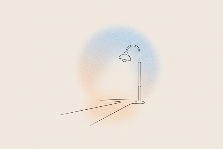 Line art illustration of a lamp casting light along a pathway