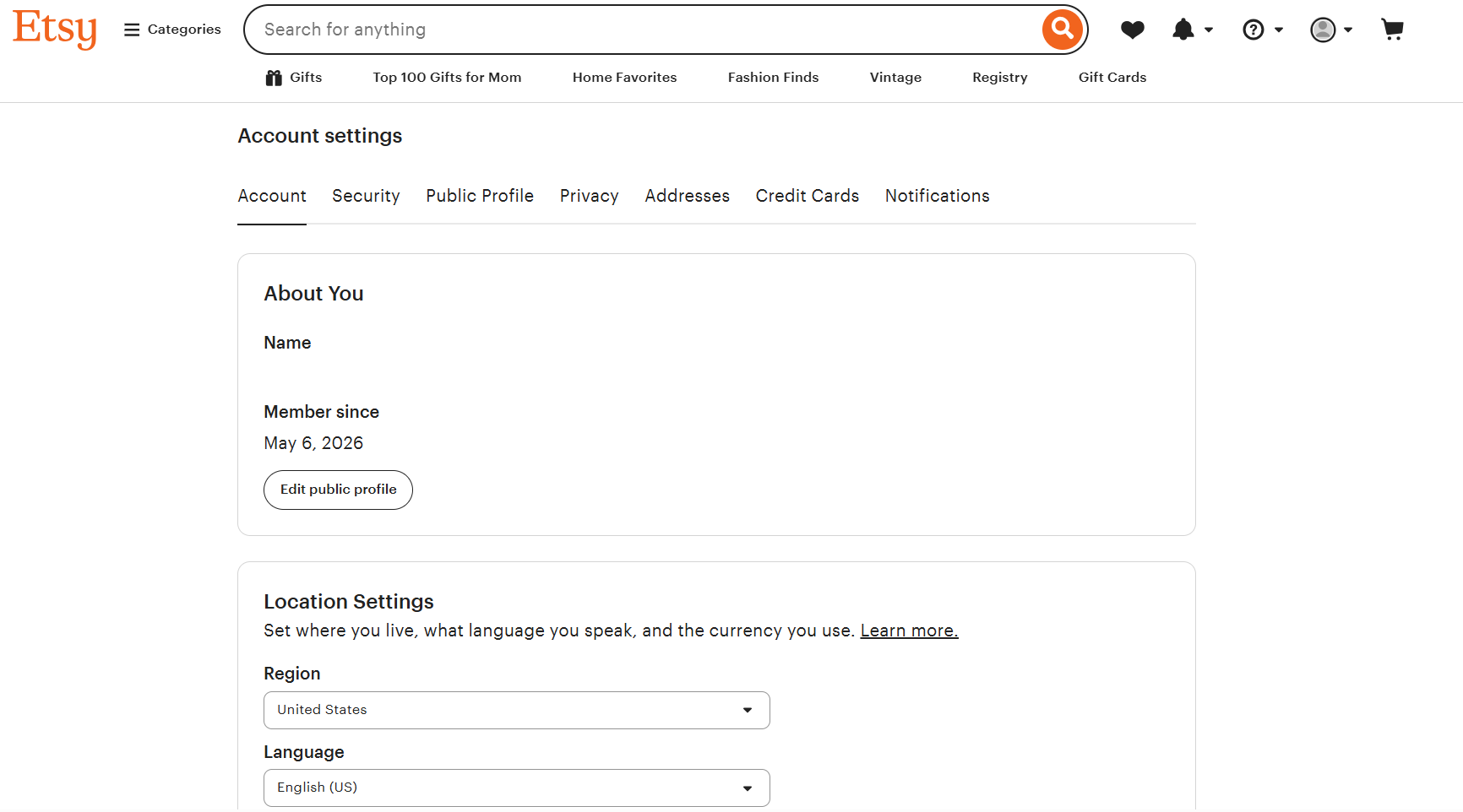 Etsy account settings page showing profile information, region and language settings, navigation tabs, search bar, and account icons within the desktop Etsy website interface.