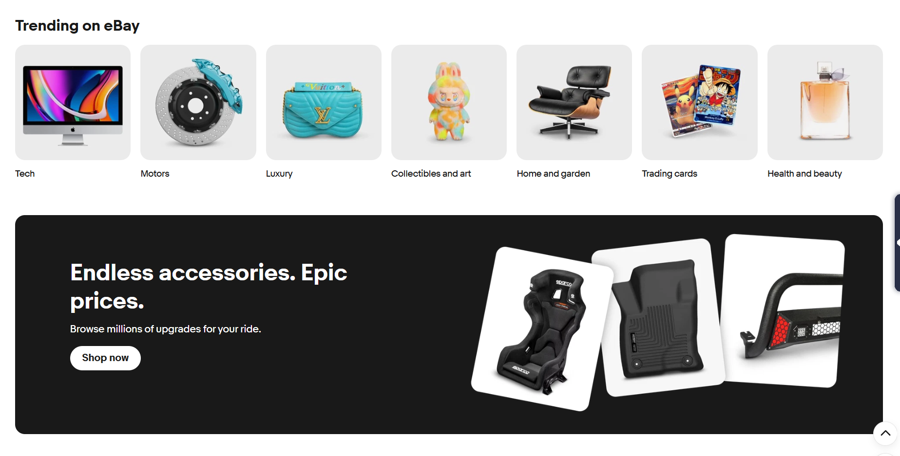 eBay homepage showcasing trending categories including tech, motors, luxury, collectibles, trading cards, and home goods, alongside automotive accessories promotions and featured deals.