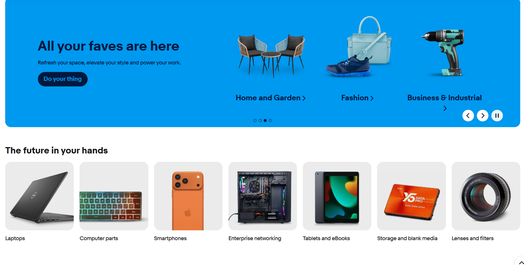 eBay banner featuring home, fashion, and business products above electronics categories including laptops, smartphones, tablets, storage devices, networking equipment, computer parts, and camera lenses.