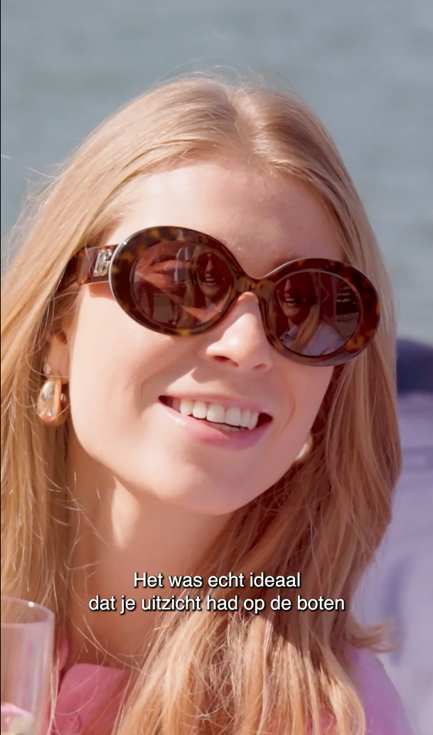 Girl laughing on a boat