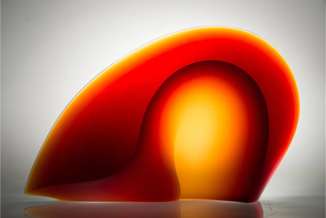 Composure sculpture, 29x30x4 inches, orange glass form