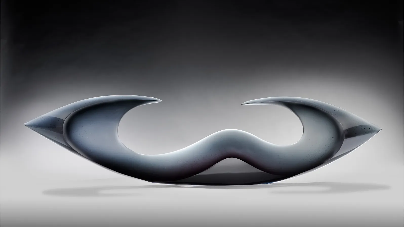 Harmony sculpture, 77x20x4 inches, grey glass form