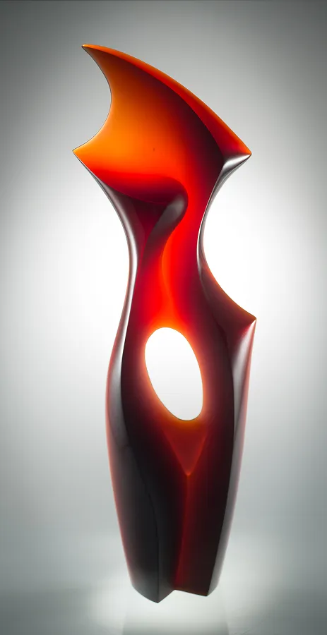 Gesture sculpture, 36x11x4 inches, orange glass form
