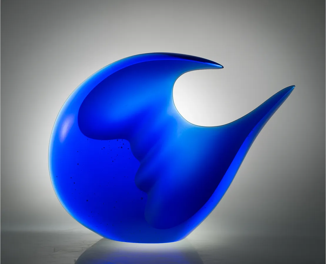 Shifting sculpture, 19x14x4 inches, blue glass form