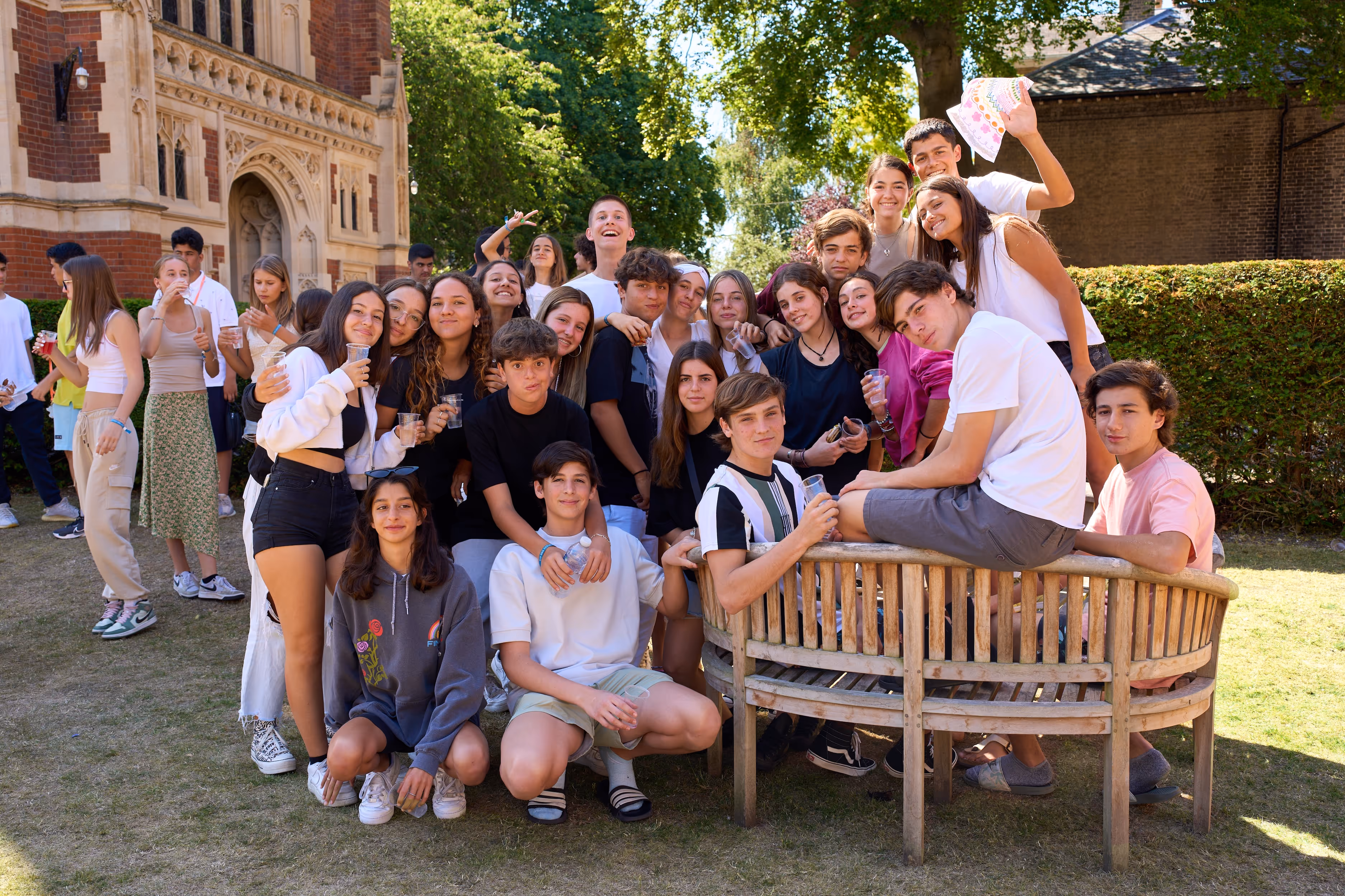 EDM exchange students outside posing for a group photo