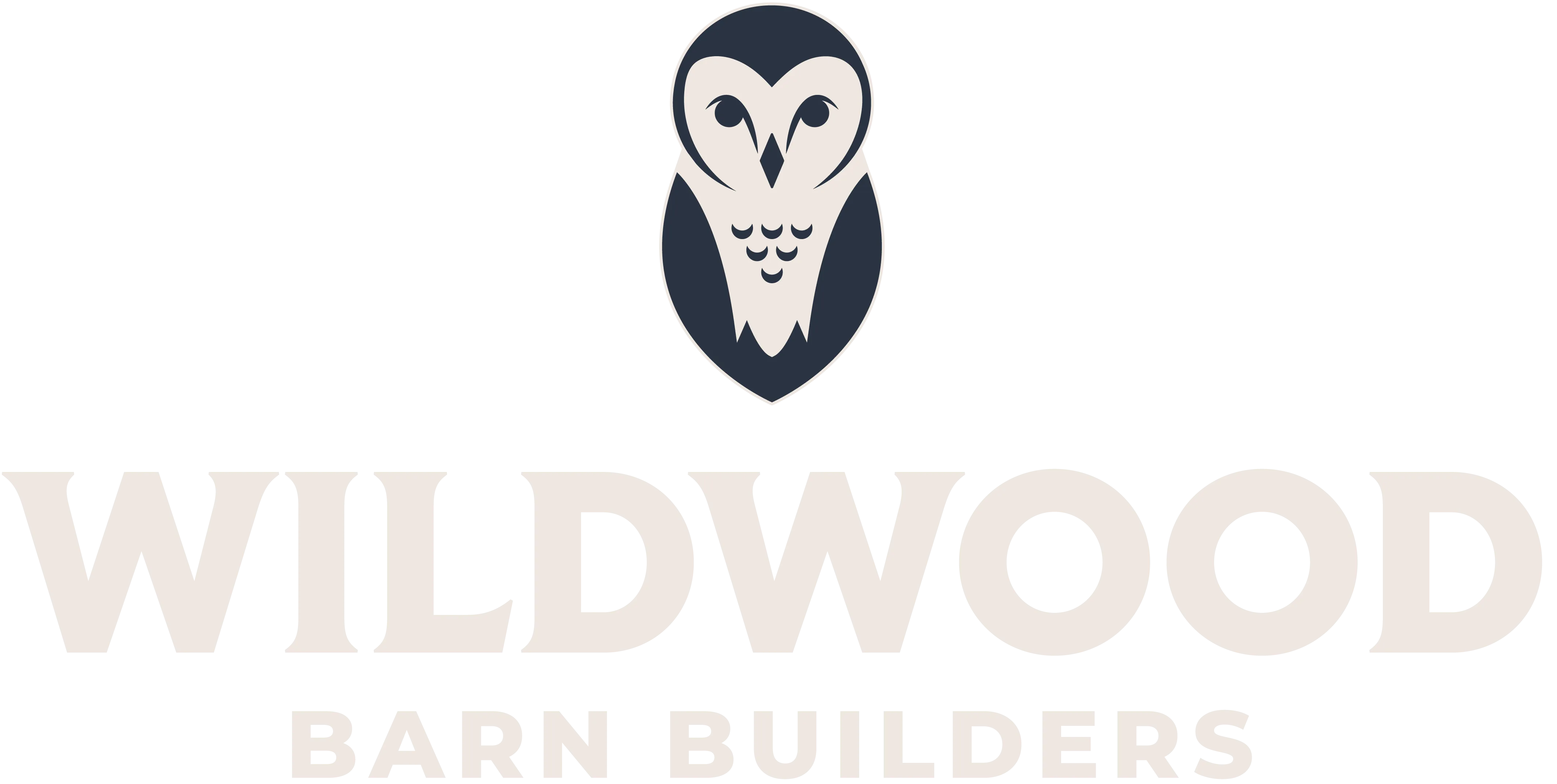 Wildwood Barn Builders logo featuring a stylized owl above the company name.