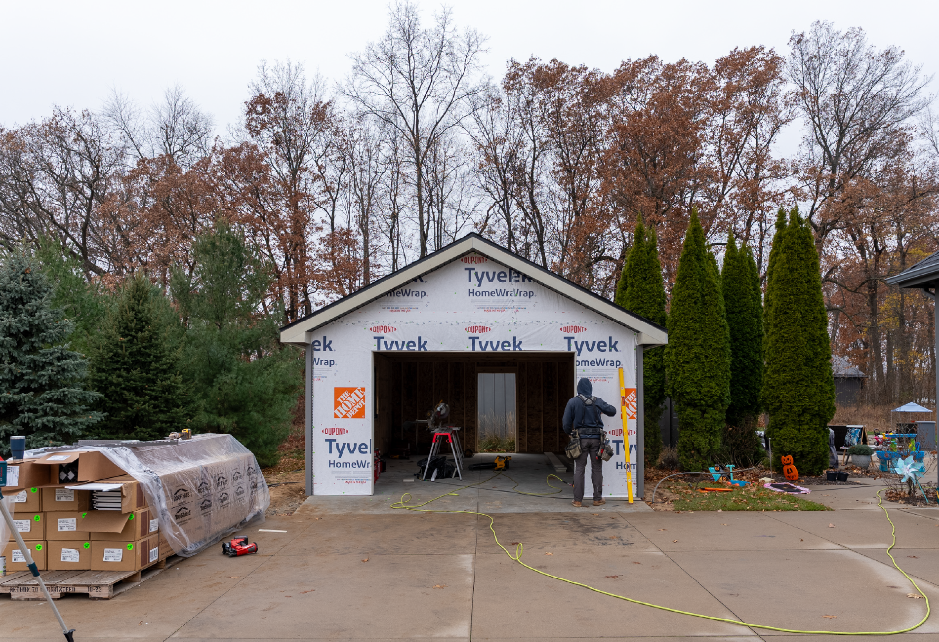 16×26 single-stall garage with insulated door, Andersen windows, finished interior, durable insulated siding, and a monolithic poured foundation.