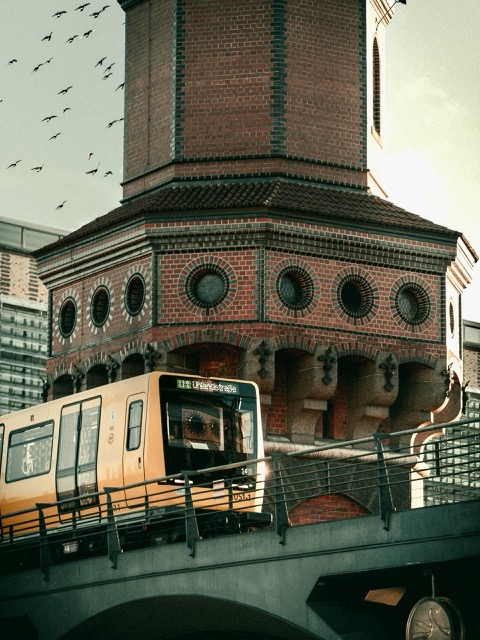 Berlin U-Bahn train and city architecture, symbolizing life in Germany