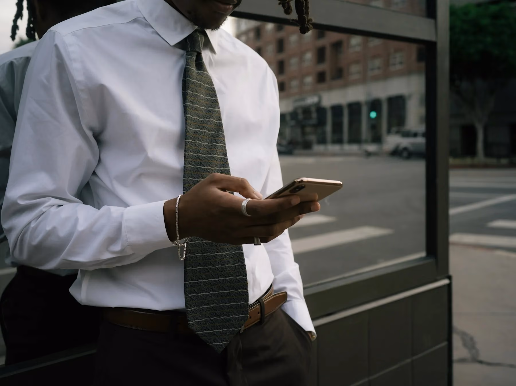Business professional checking phone notification office