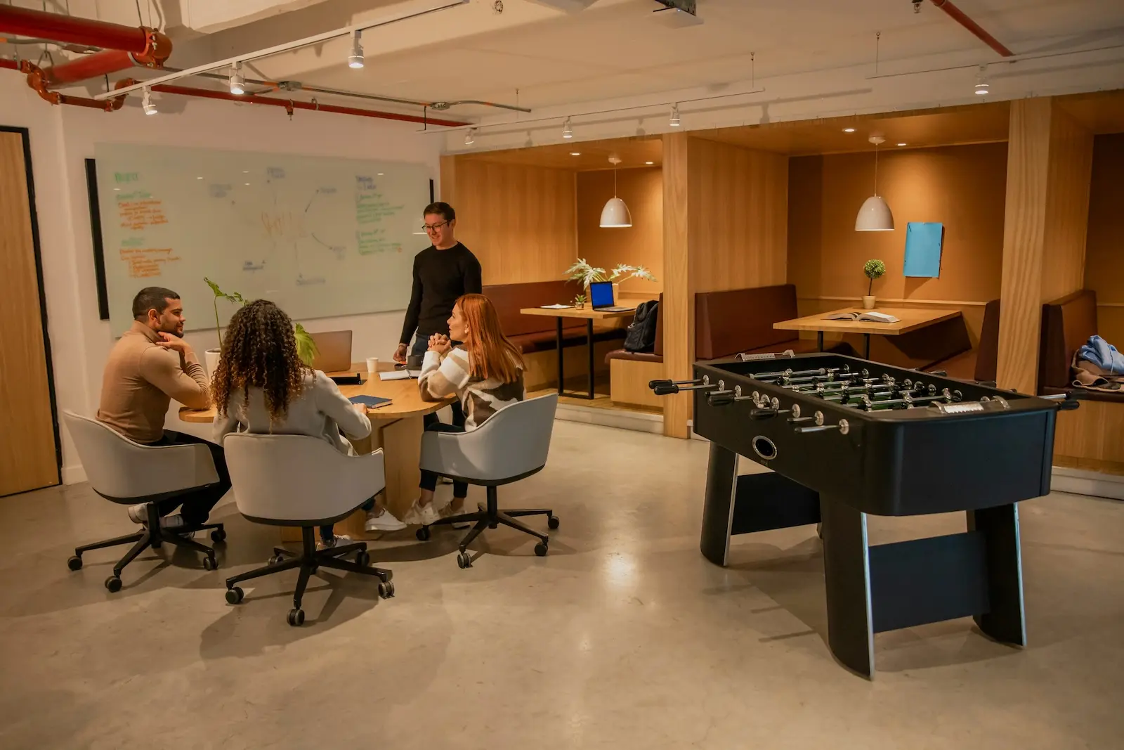 Team meeting in a co-working space, one of four business address options available to Delaware LLC owners