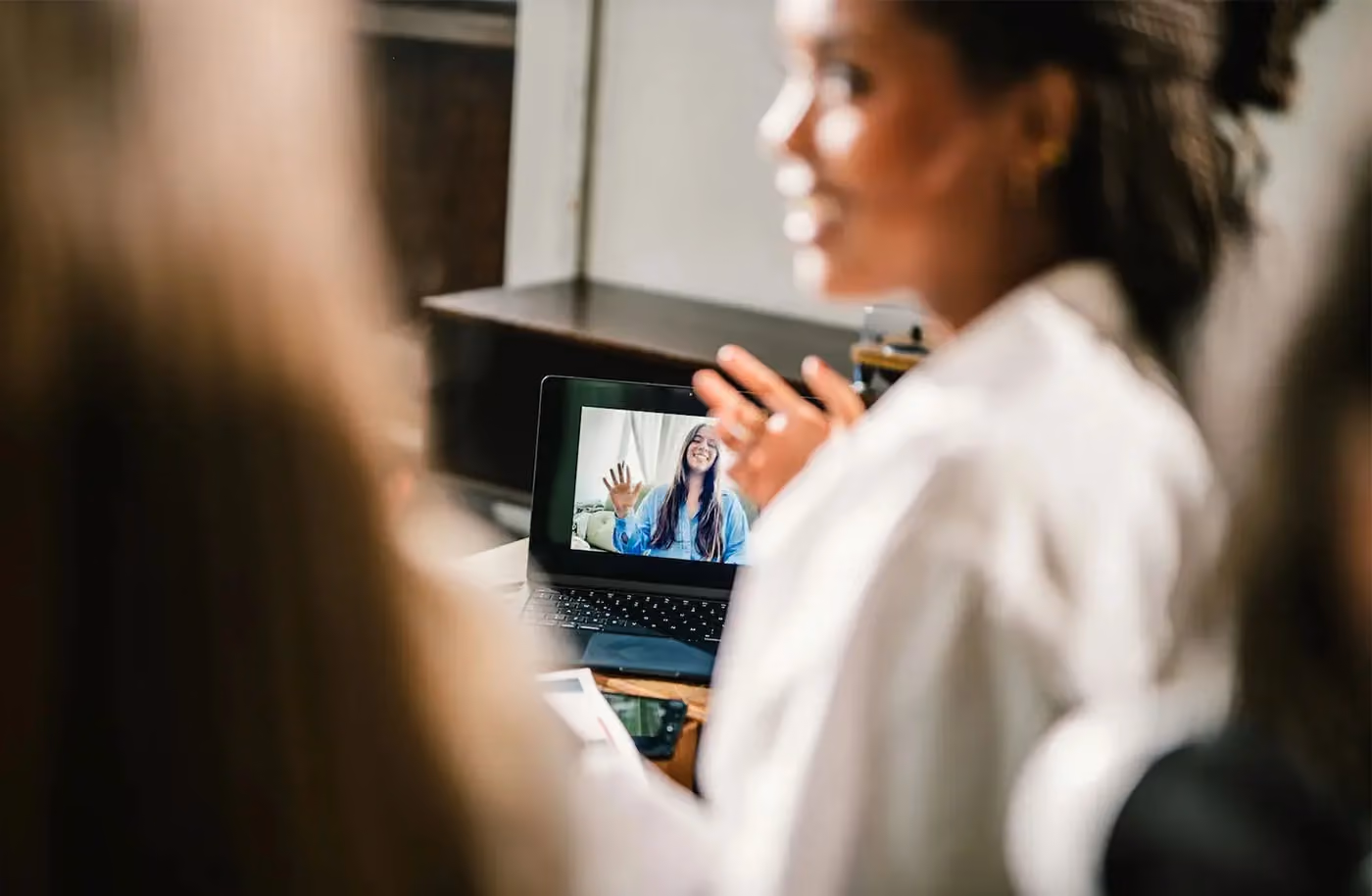 Distributed startup team on a video call, representing remote-first operations with a shared business address