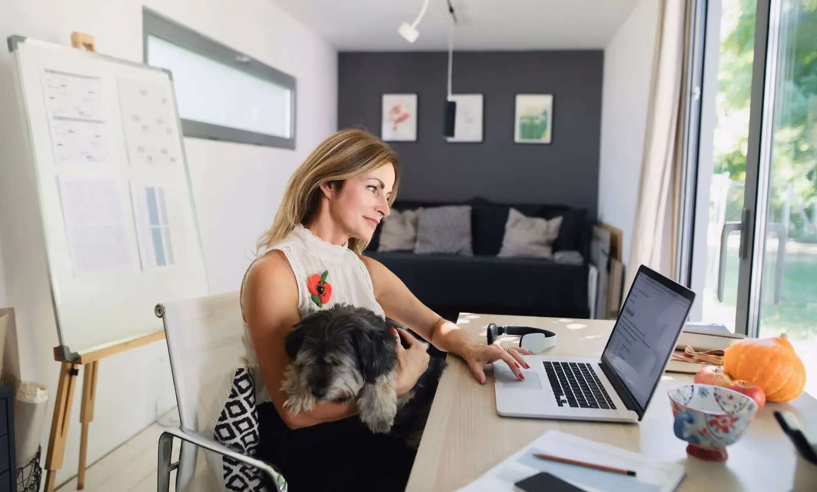 Small business owner working from home on a laptop without a physical office