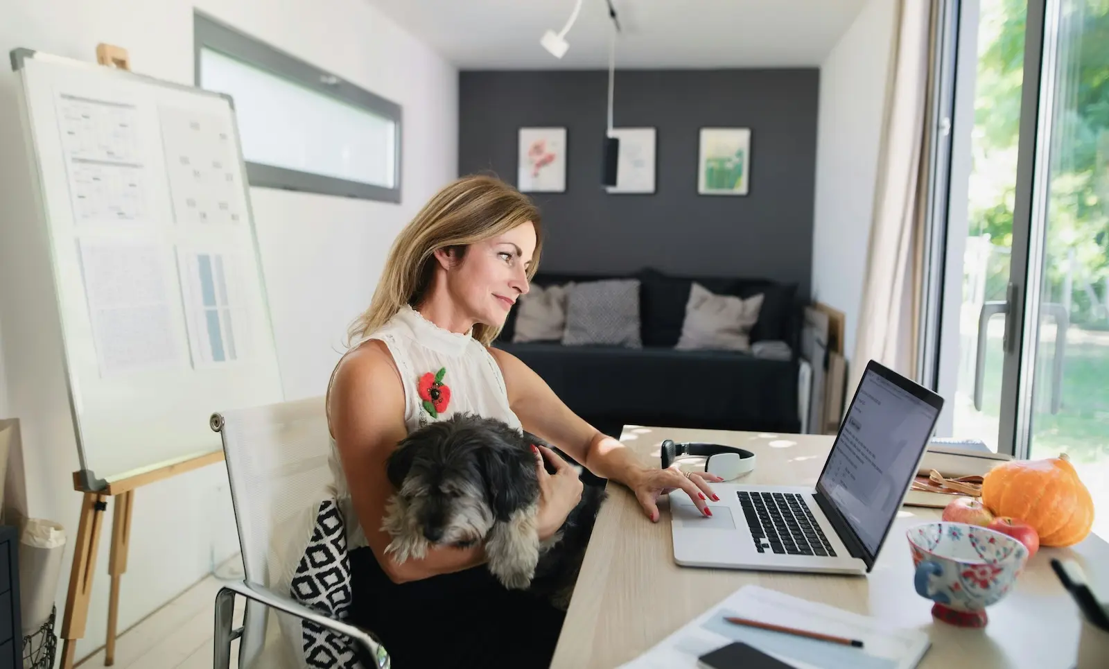 Small business owner working from home on a laptop without a physical office