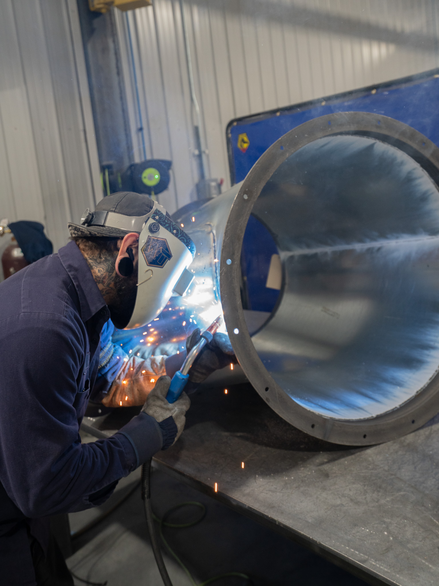 Hand welding a branch pipe