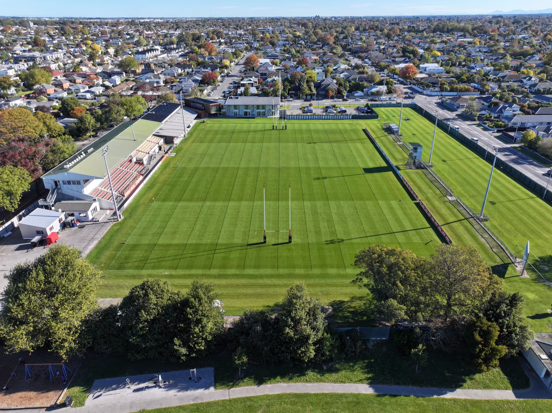 Rugby field looking down the field long ways drone shot in Christchurch New Zealand