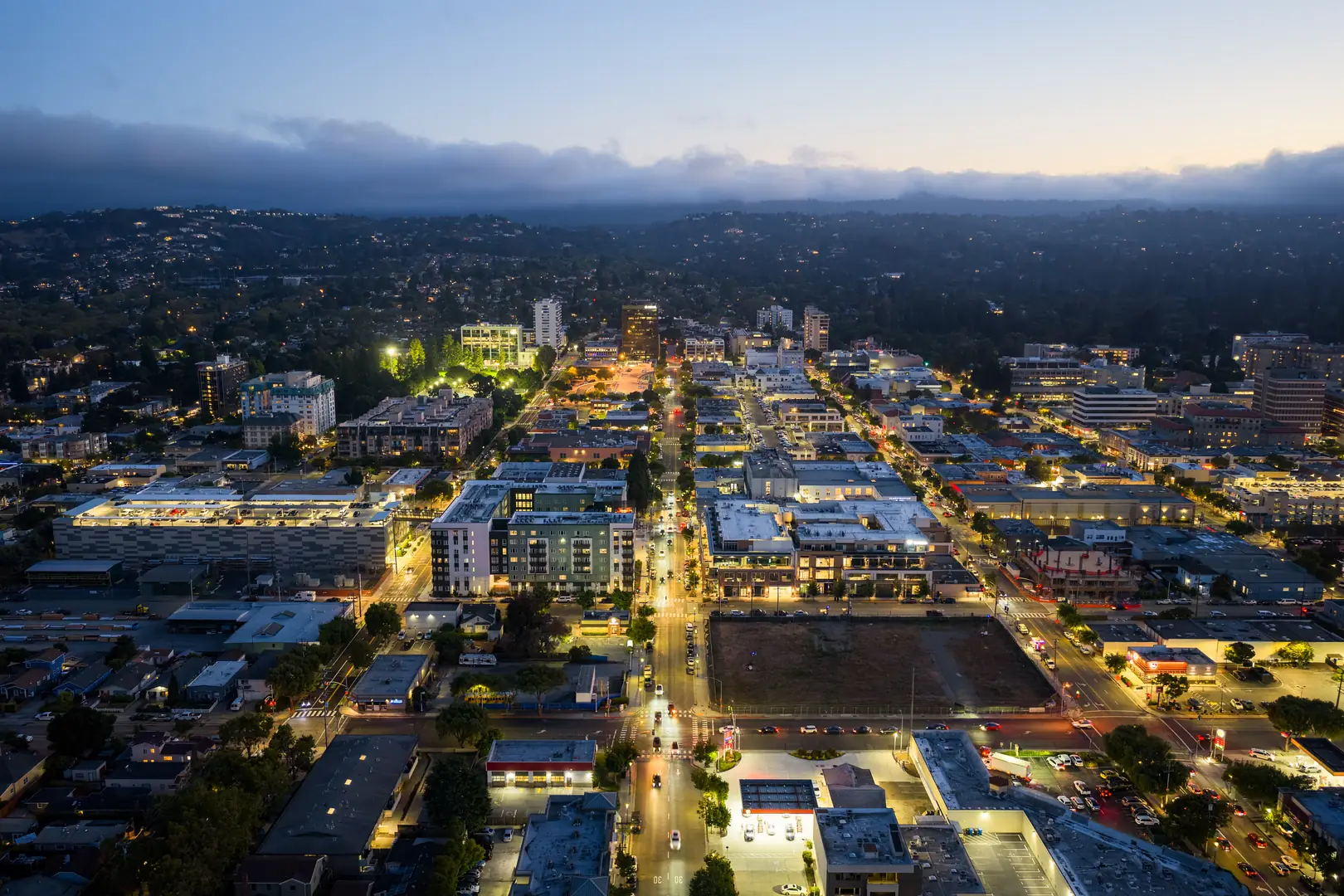 Downtown San Mateo at dusk, looking west along 4th Avenue toward the hills