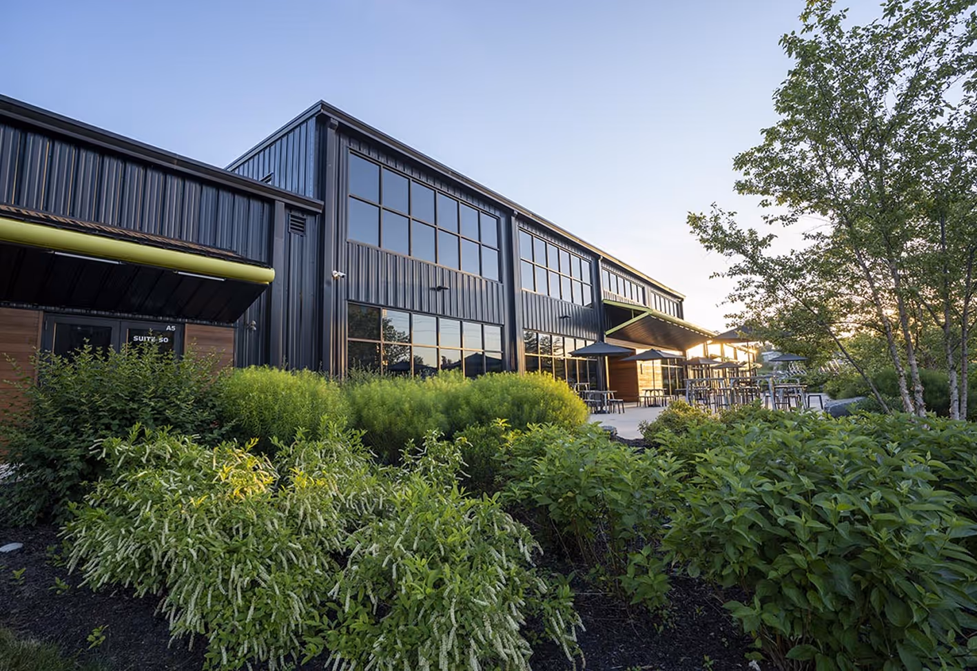 Exterior of Rock Lititz Pod 2, lush greenery and modern building