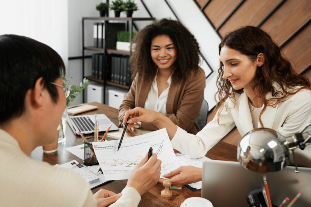 A group of people sitting at a table for business purposes.