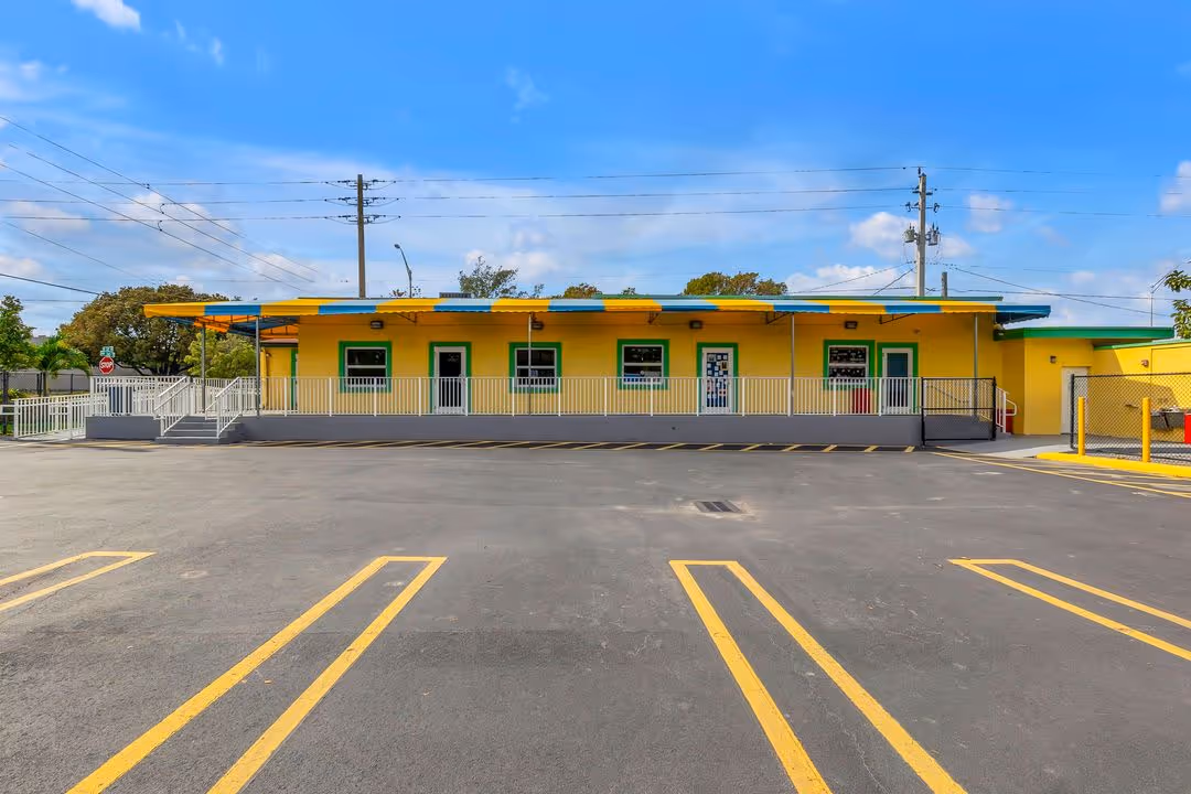 Front view of a Watch Me Grow campus, a colorful and inviting facility offering top-rated preschool and VPK programs
