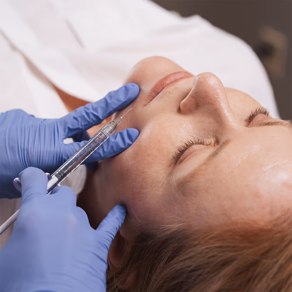 A patient is injected with lip filler after getting dermal filler at Laser Center of Marin