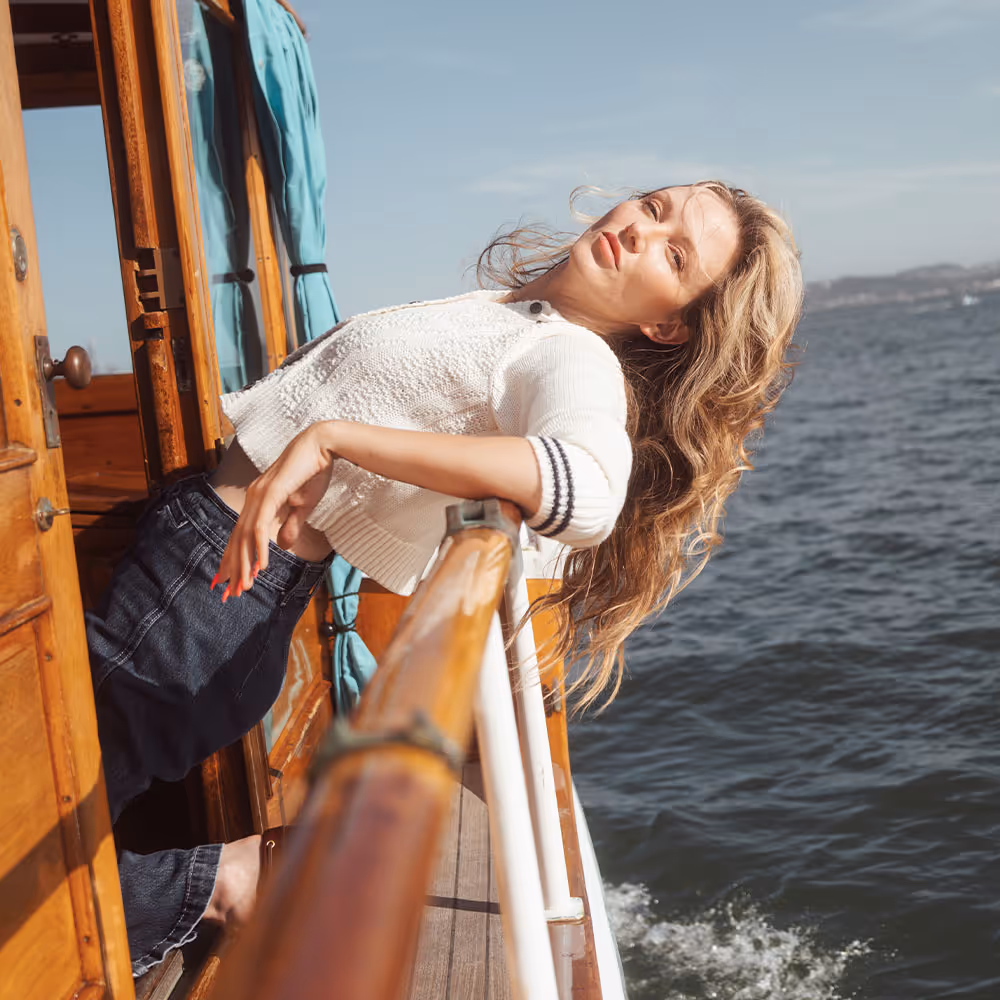 A provider is injecting dermal filler at Laser Center of Marin, and the image next to it is a woman leaning on the side of a boat with a gif of an injection in the lower corner