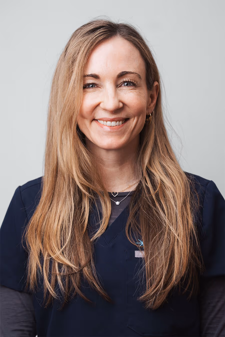 A portrait photo of Meghan Dasher, a nurse practitioner who provides dermal filler at Laser Center of Marin