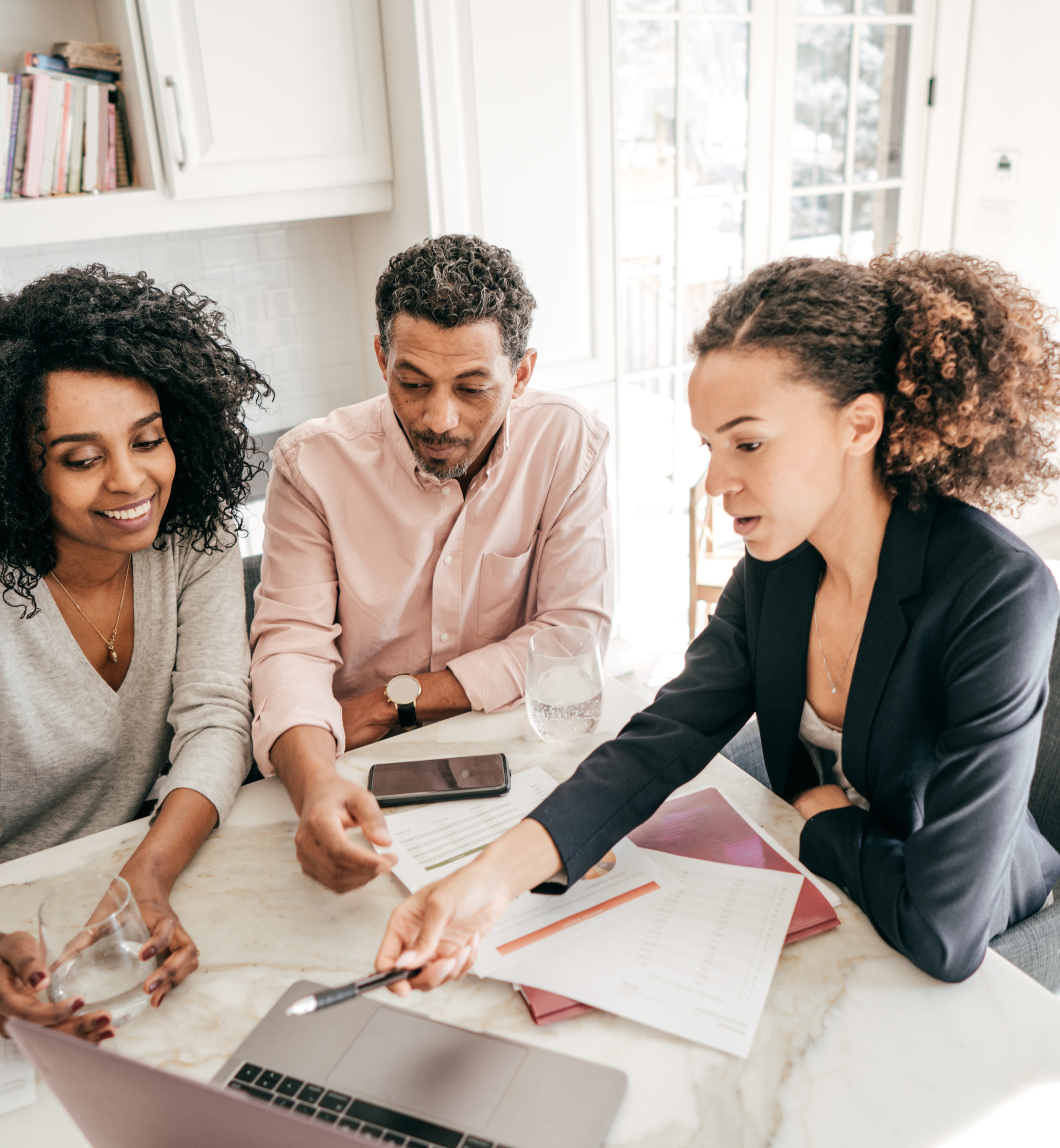 Healthcare provider consulting elderly patient — supporting medical practices with financial planning, bookkeeping, and tax services