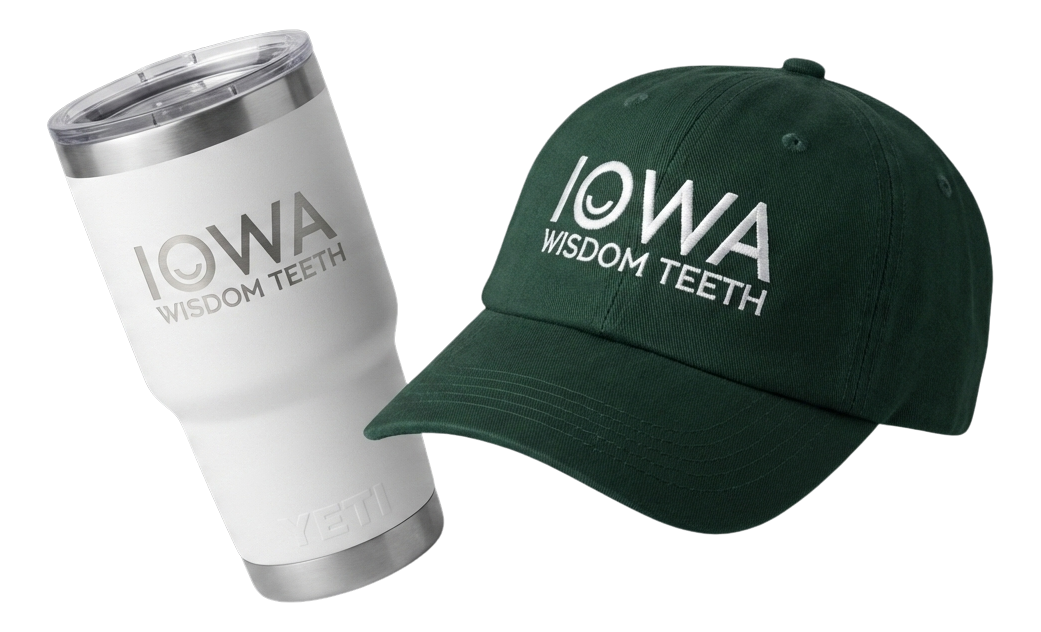 Black fitness tracker, green folded jacket with white earphones, and black massage gun labeled Theragun Prime.