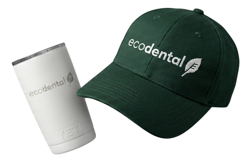 Black fitness tracker, green folded jacket with white earphones, and black massage gun labeled Theragun Prime.