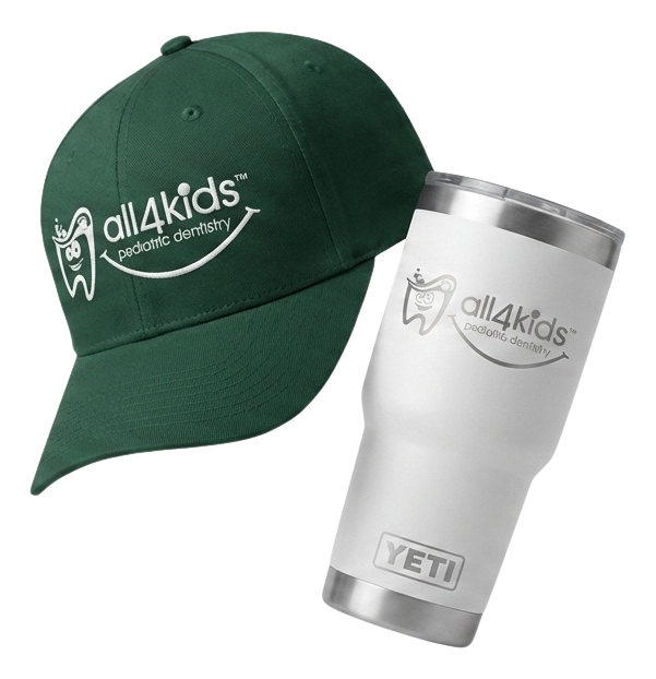 Black fitness tracker, green folded jacket with white earphones, and black massage gun labeled Theragun Prime.