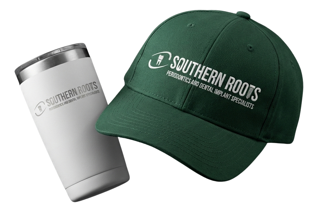 Black fitness tracker, green folded jacket with white earphones, and black massage gun labeled Theragun Prime.